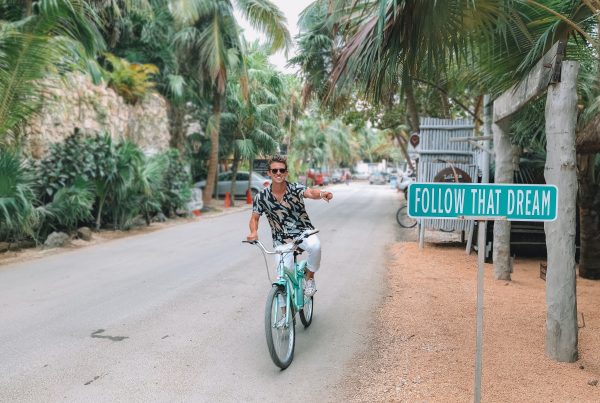 Tulum Riviera Maya Follow That Dream Guy Riding a Bike