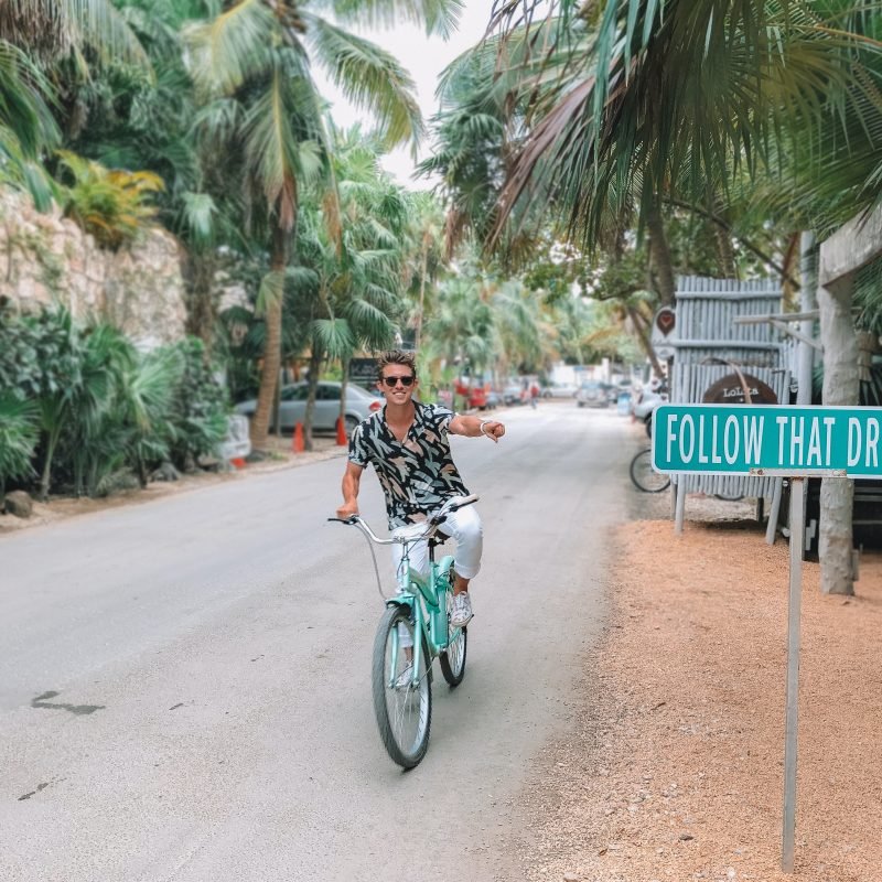 Tulum Riviera Maya Follow That Dream Guy Riding a Bike